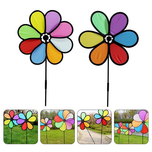 Kids playing colorful windmill - playing,